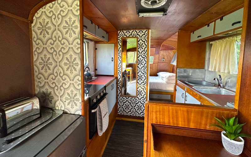 Looking through from the lounge-dinner to the kitchenette and bedroom space