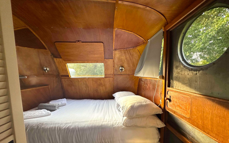 Bing has a second external door from the bedroom with rate porthole window